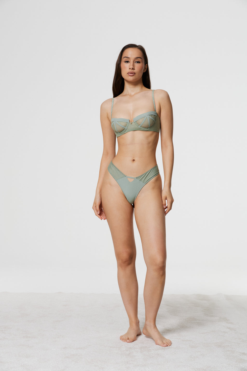 Full-length front view of model standing in Azalea Green Voile Balconette Bra and matching thong set, displaying the complete lightweight lingerie silhouette.