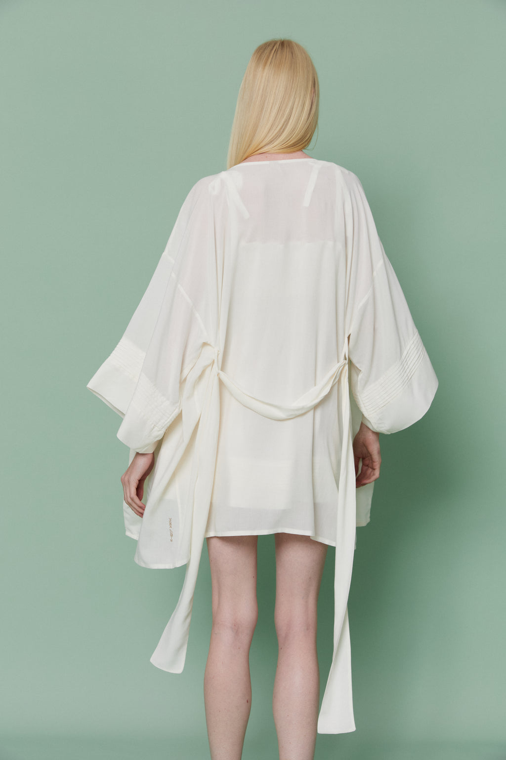 Rear full-length view of model in Azalea White Voile Kimono Robe, showcasing sheer voile fabric and long self-tie belt.