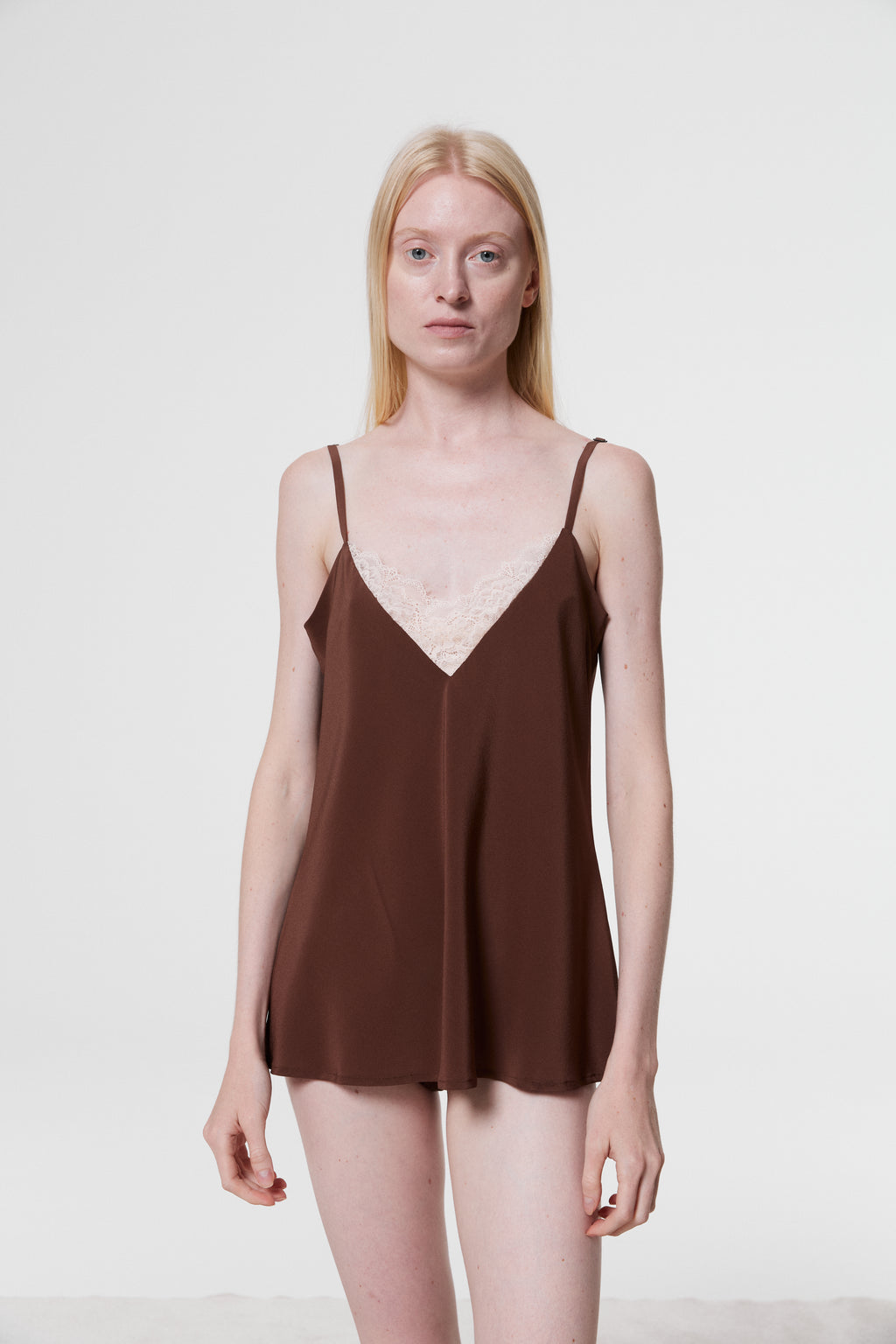 Full-length front view of model wearing Monsella Brown Silk Camisole with fluid crêpe Mongol silk drape and lace V-neckline.