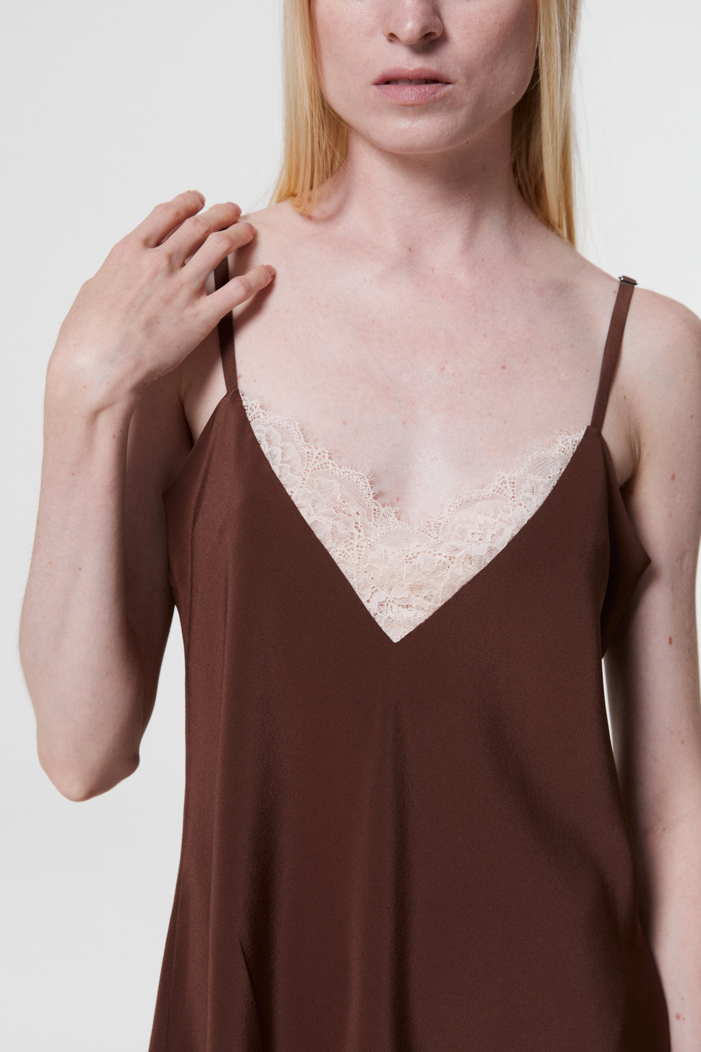 Model wearing Monsella Brown Silk Camisole with delicate lace V-neck trim and thin adjustable straps.